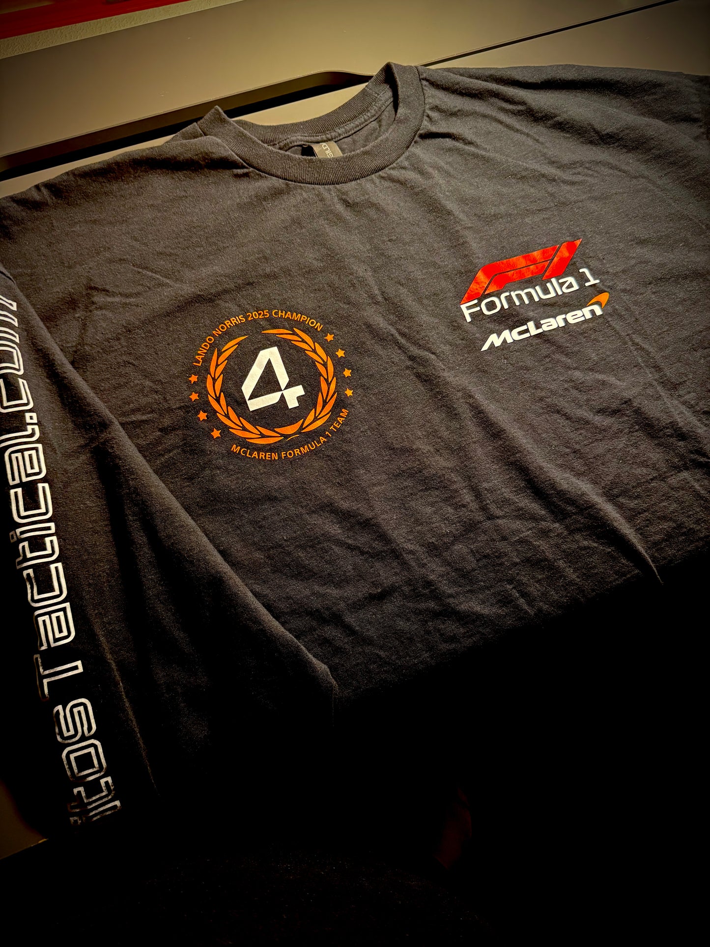 Celebrate the 2025 champion with this bold F1 Lando Norris #4 long sleeve